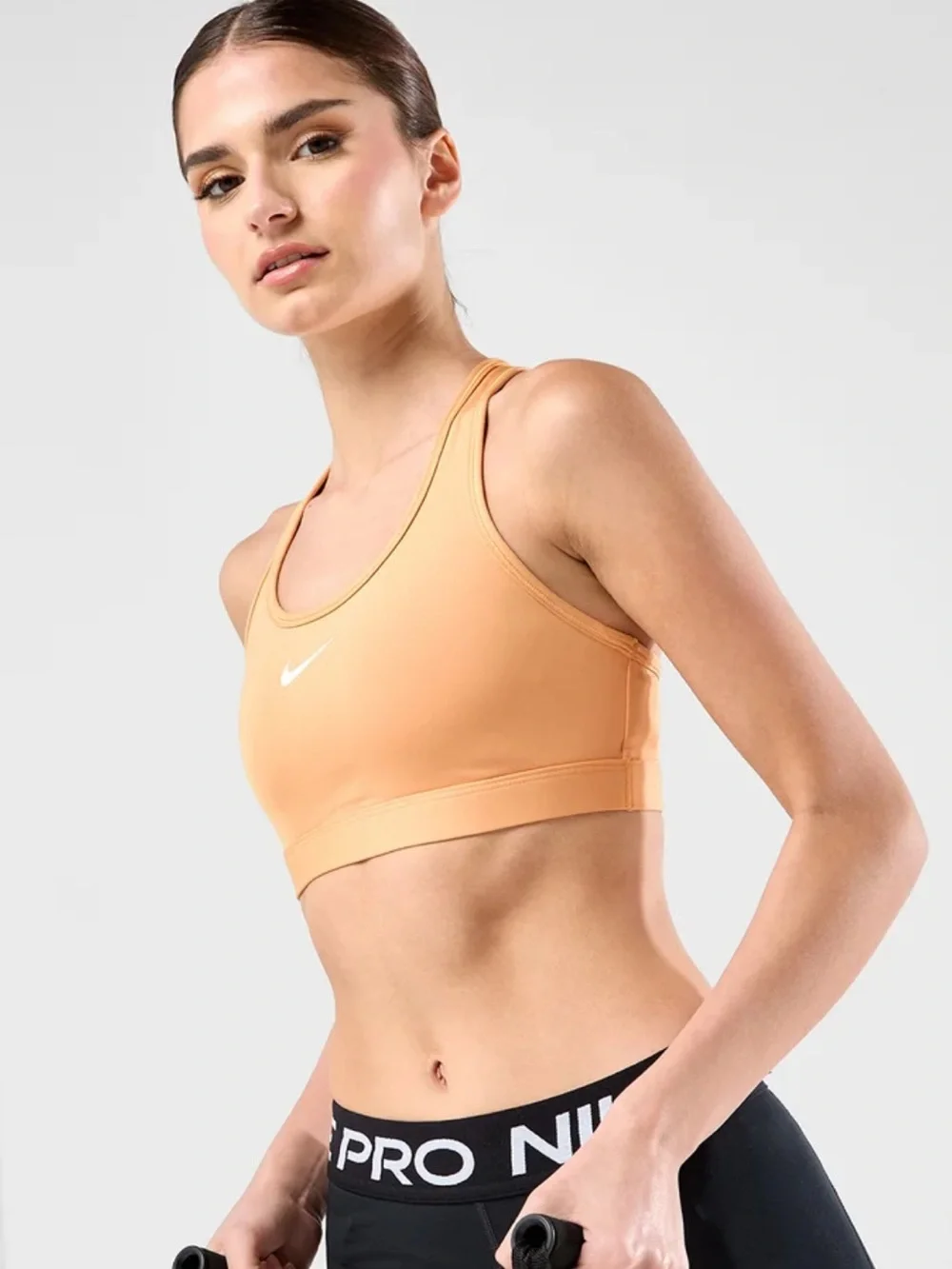 Nike Logo Medium Support Padded Sports Bra, Copper Moon, Small